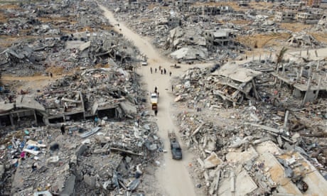 A drone view shows Palestinian houses and buildings lying in ruins in Rafah